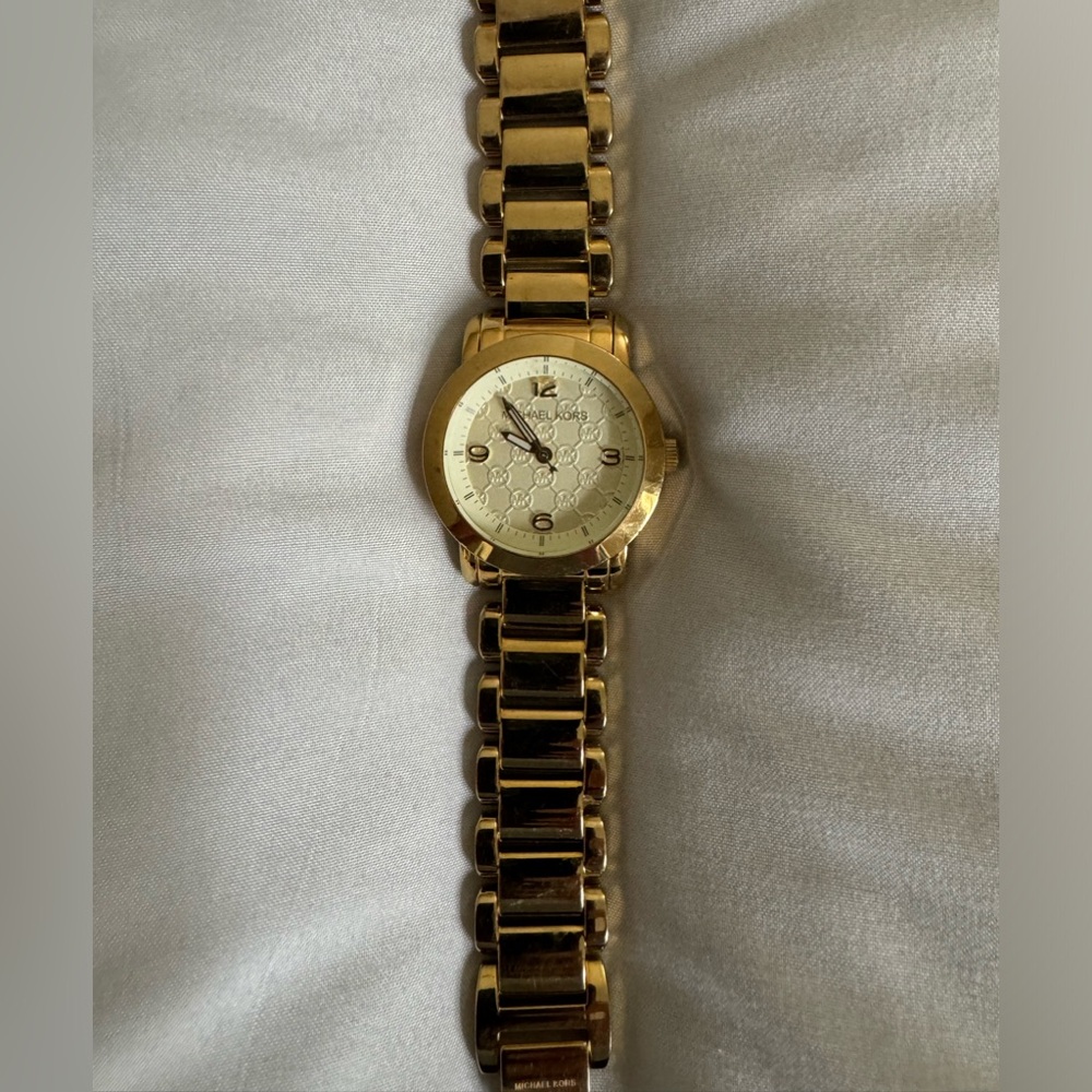 Michael Kors watch.  Gold.